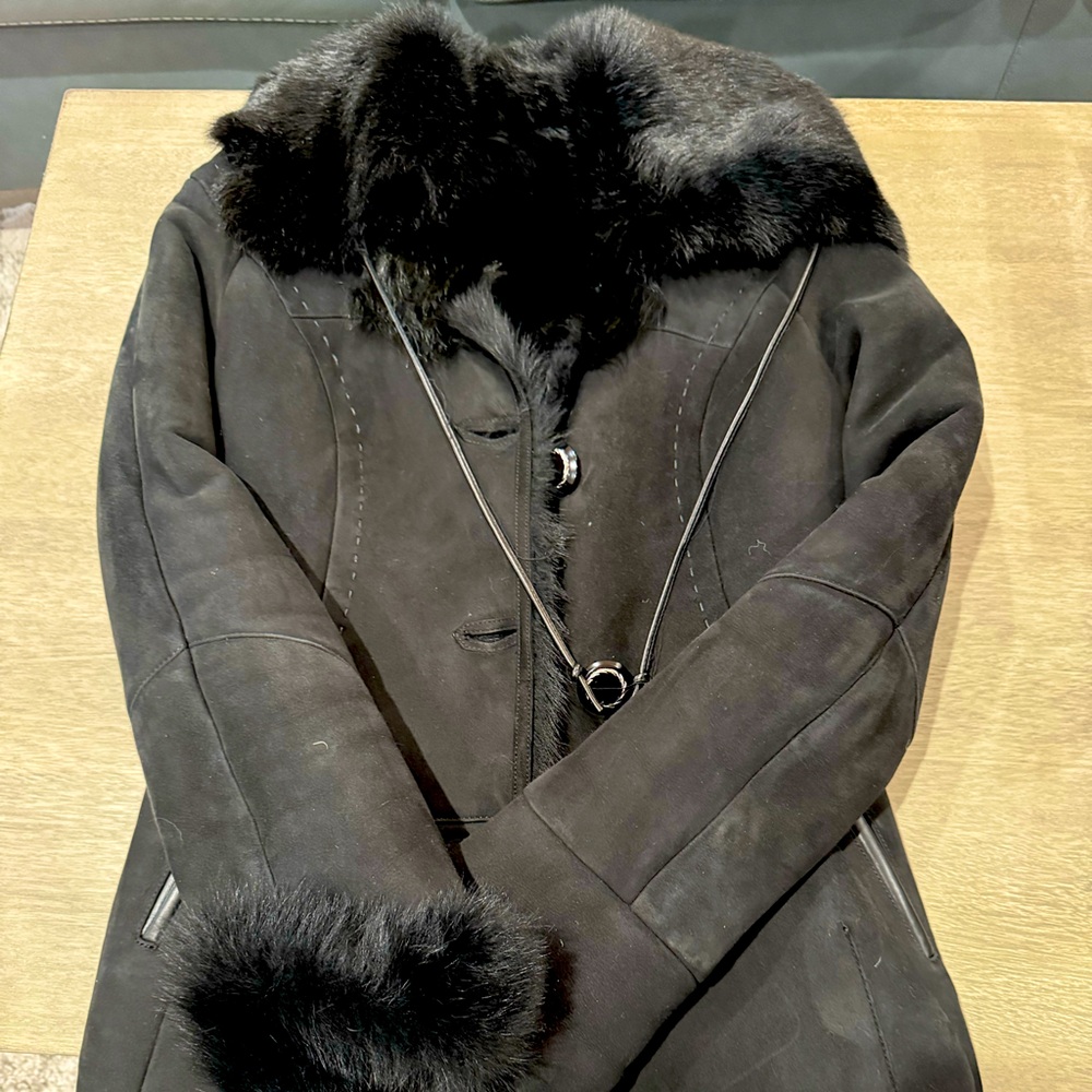 Womans shearling black coat.